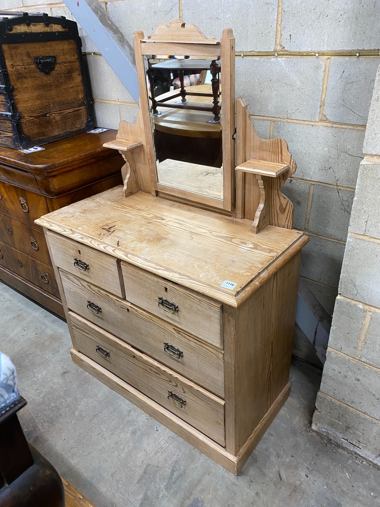 A late 19th century stripped pine dressing chest, fitted with two short and three long drawers, 551 cm high, 101 cm wide, 47 cm deep